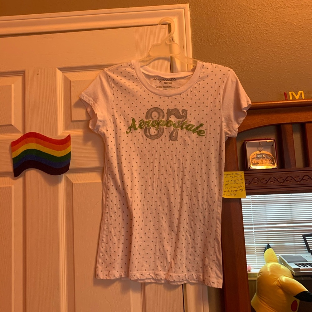 While polka dot shirt